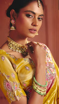 yellow saree with embroidery border