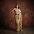 Golden colour full handwork saree