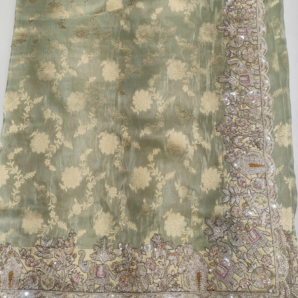 Elegant sage green floral border saree