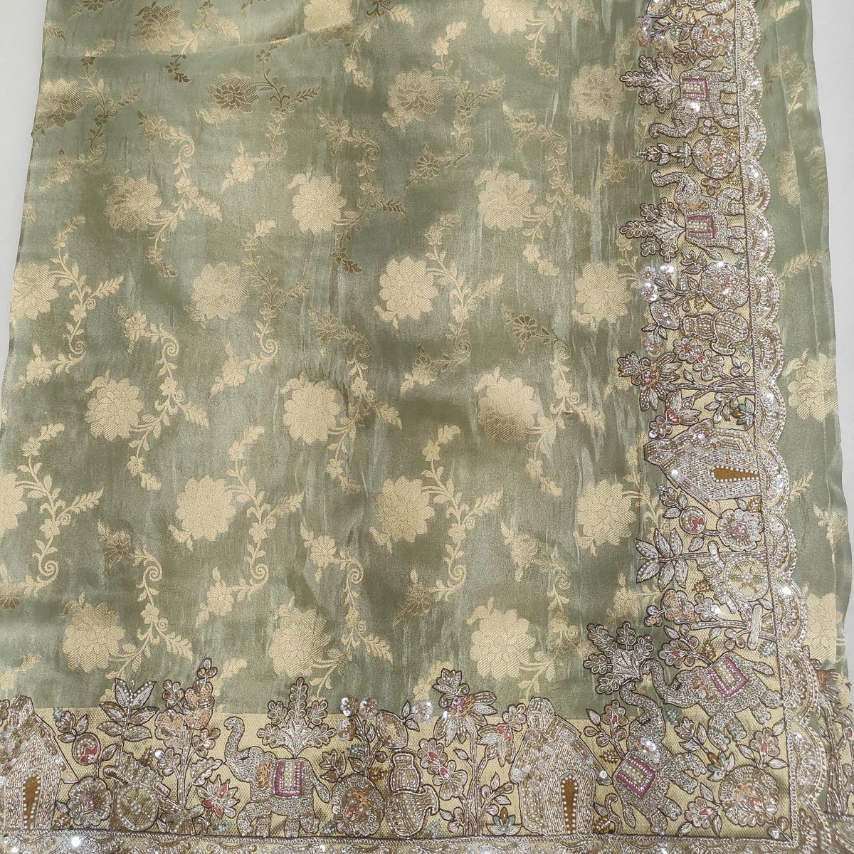 Elegant sage green floral border saree
