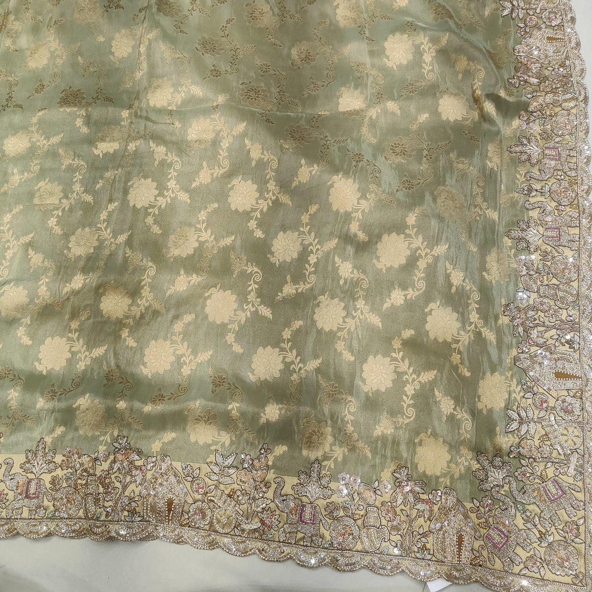 Elegant sage green floral border saree