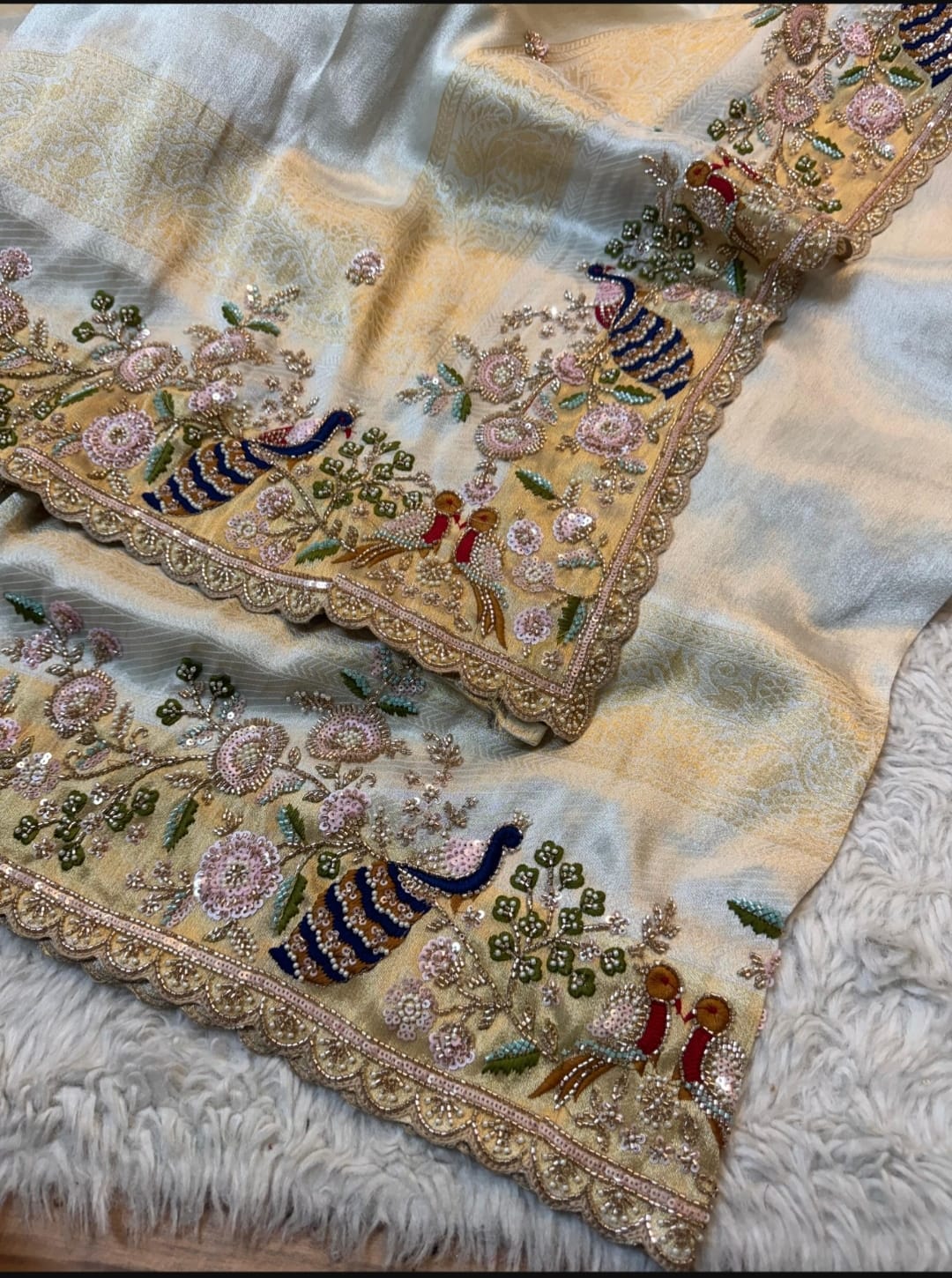 Pastel embroidered peacock saree