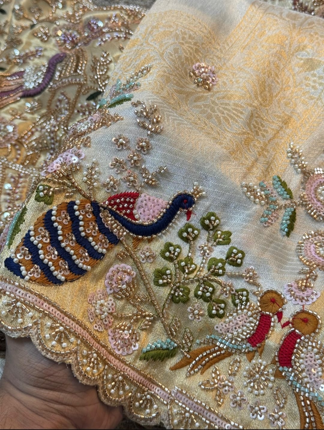Pastel embroidered peacock saree