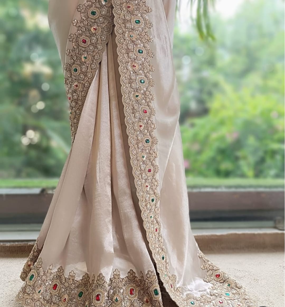 Elegant hand embroidered silver colour saree